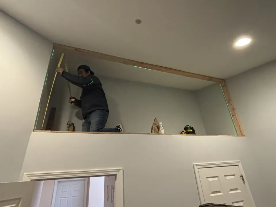 Measuring the open loft cavity above the closet