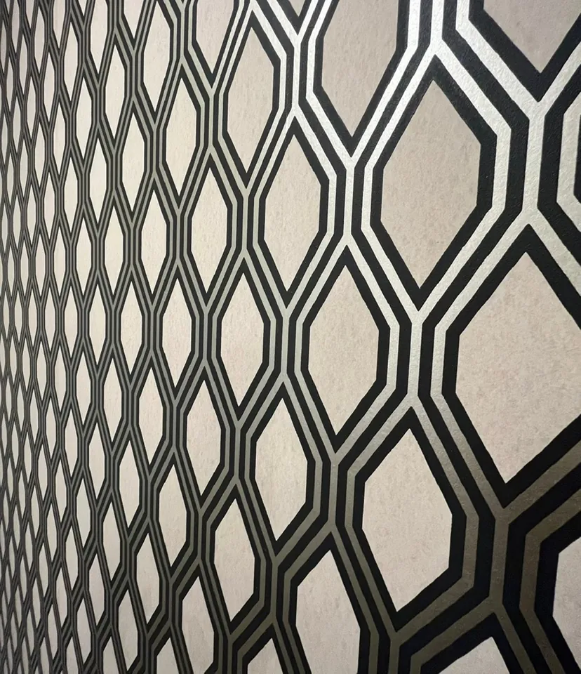Detail of the matte diamond metallic wallpaper monogram pattern